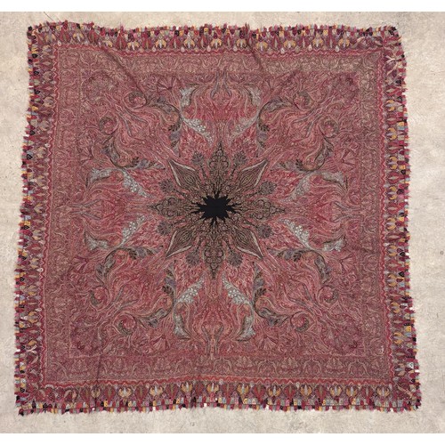 398 - A 19th century finely woven Kashmir style paisley shawl, in ivory with a paisley pattern border, fri... 