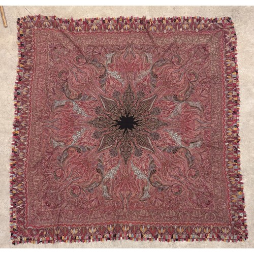 398 - A 19th century finely woven Kashmir style paisley shawl, in ivory with a paisley pattern border, fri... 