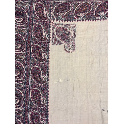 398 - A 19th century finely woven Kashmir style paisley shawl, in ivory with a paisley pattern border, fri... 