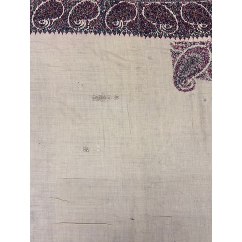 398 - A 19th century finely woven Kashmir style paisley shawl, in ivory with a paisley pattern border, fri... 