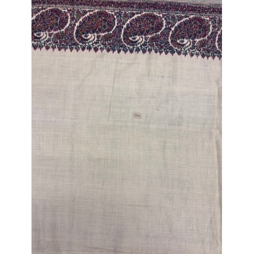 398 - A 19th century finely woven Kashmir style paisley shawl, in ivory with a paisley pattern border, fri... 