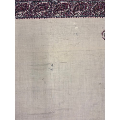 398 - A 19th century finely woven Kashmir style paisley shawl, in ivory with a paisley pattern border, fri... 