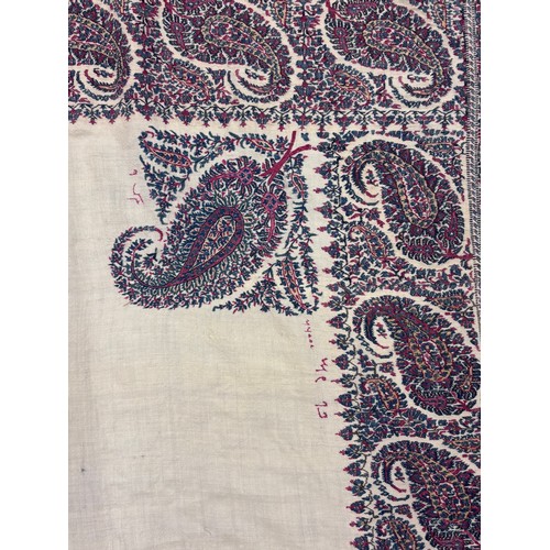 398 - A 19th century finely woven Kashmir style paisley shawl, in ivory with a paisley pattern border, fri... 
