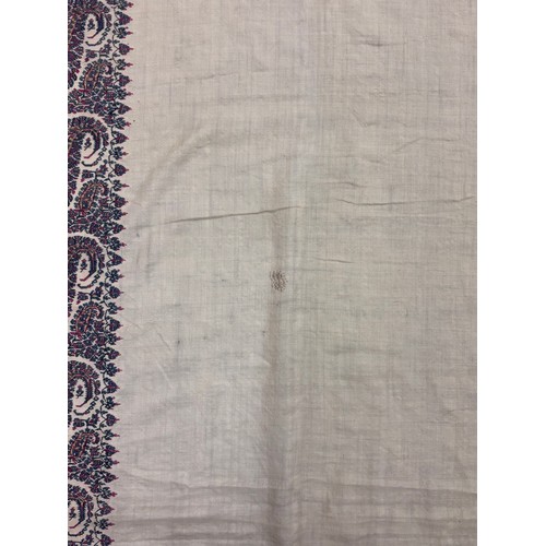 398 - A 19th century finely woven Kashmir style paisley shawl, in ivory with a paisley pattern border, fri... 