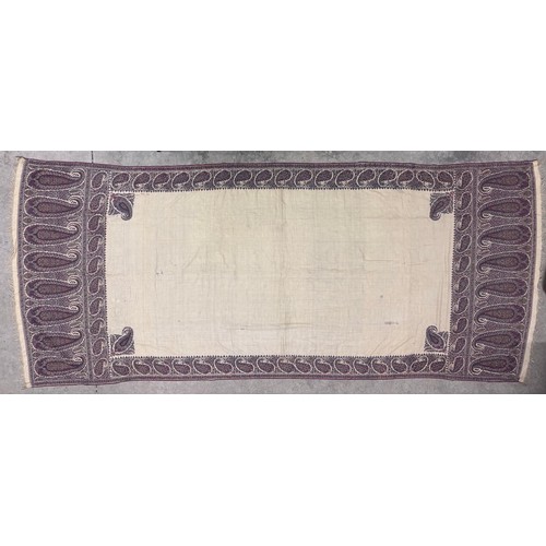 398 - A 19th century finely woven Kashmir style paisley shawl, in ivory with a paisley pattern border, fri... 