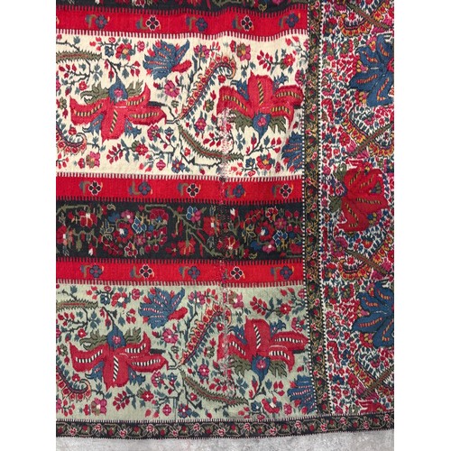 399 - A 19th century finely woven Kashmir style shawl, the ivory ground with delicate foliate borders and ... 