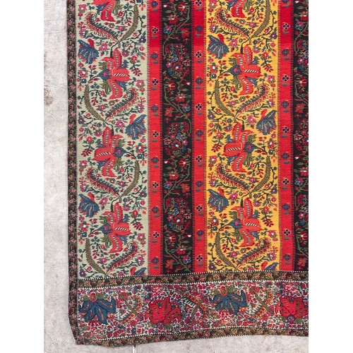 399 - A 19th century finely woven Kashmir style shawl, the ivory ground with delicate foliate borders and ... 