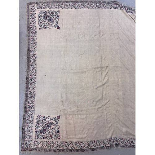 399 - A 19th century finely woven Kashmir style shawl, the ivory ground with delicate foliate borders and ... 