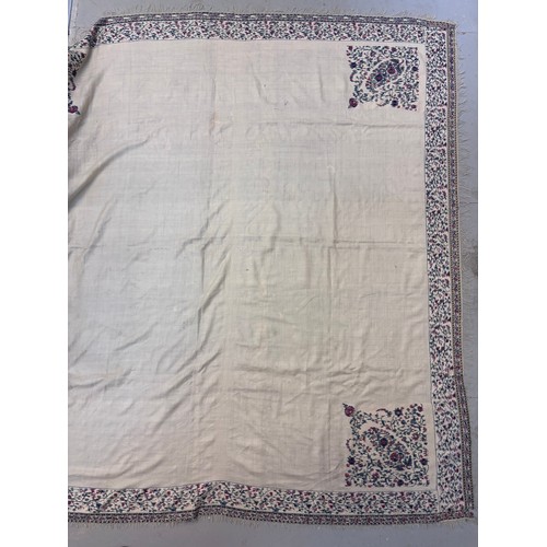 399 - A 19th century finely woven Kashmir style shawl, the ivory ground with delicate foliate borders and ... 