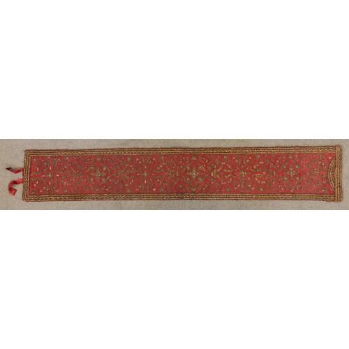 405 - A 19th century green silk damask and metallic edged apron, on yellow fabric backing, 116cm long, wit... 