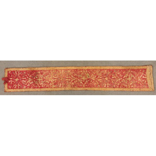 405 - A 19th century green silk damask and metallic edged apron, on yellow fabric backing, 116cm long, wit... 