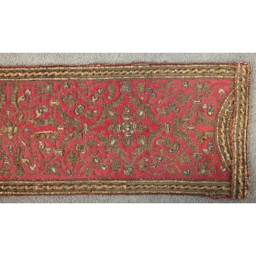 405 - A 19th century green silk damask and metallic edged apron, on yellow fabric backing, 116cm long, wit... 