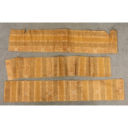 409 - An Indian gauze bandhani sari panel, embroidered with repeating geometric gulls against a red ground... 