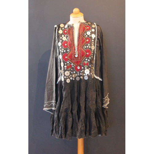 418 - A collection of Continental costume and textiles, to include a Turkish silk long line waistcoat, an ... 