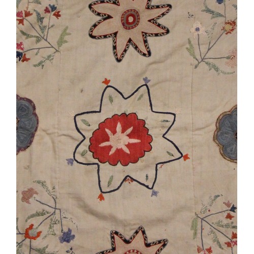 402 - A Suzani needlework panel, Uzbekistan 20th century, of square section embroidered with geometric flo... 