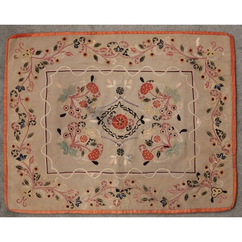 402 - A Suzani needlework panel, Uzbekistan 20th century, of square section embroidered with geometric flo... 