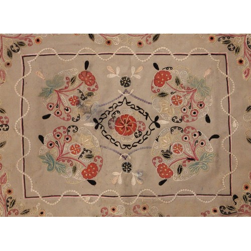 402 - A Suzani needlework panel, Uzbekistan 20th century, of square section embroidered with geometric flo... 
