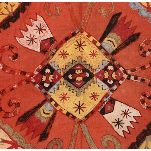 402 - A Suzani needlework panel, Uzbekistan 20th century, of square section embroidered with geometric flo... 