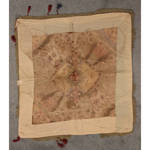 402 - A Suzani needlework panel, Uzbekistan 20th century, of square section embroidered with geometric flo... 