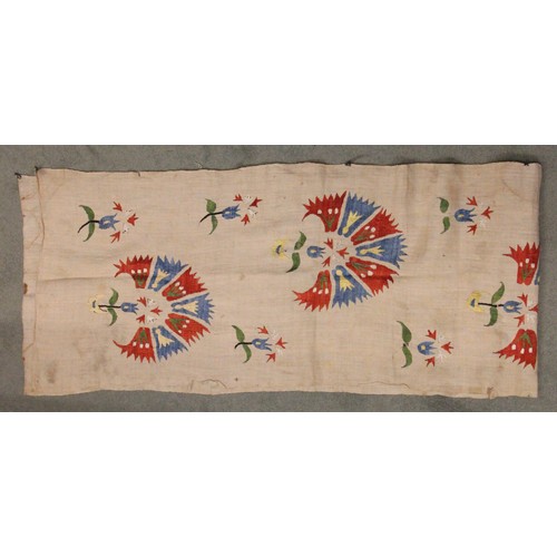 402 - A Suzani needlework panel, Uzbekistan 20th century, of square section embroidered with geometric flo... 