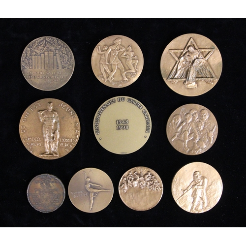 529 - Ten bronze medallions commemorating various literary and artistic figures, to include two to Leo Tol... 