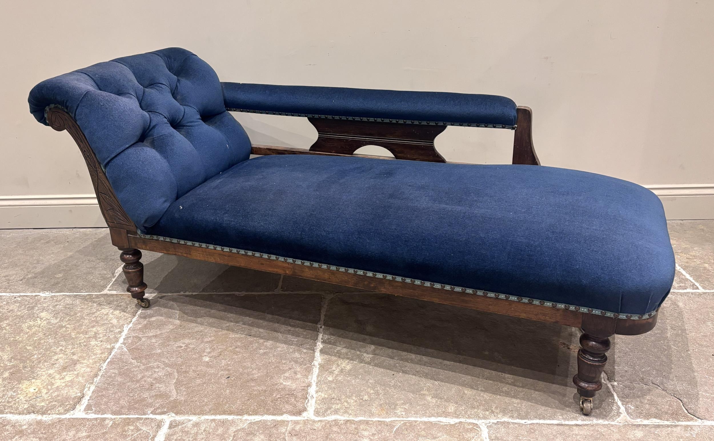 A late 19th century walnut and blue velour upholstered chaise longue ...