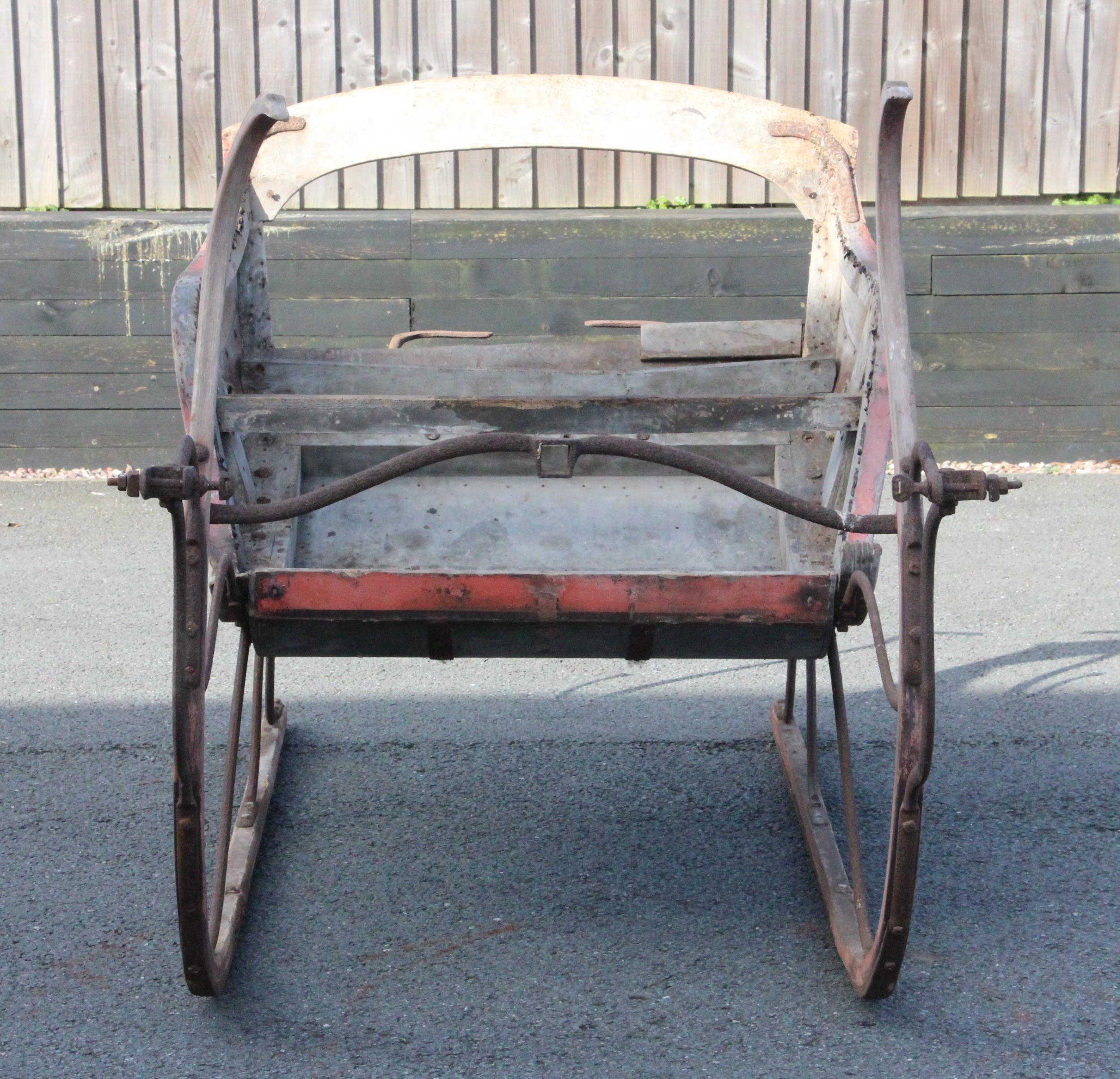 A horse drawn two seat sleigh, believed to be early 19th century, of ...