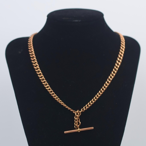 An early 20th century 9ct gold watch chain, the graduated curb links ...