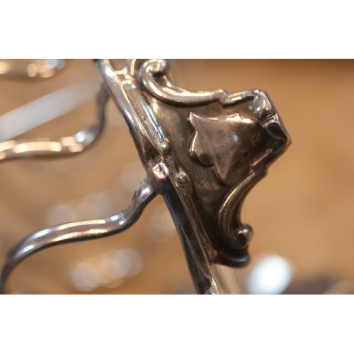 A Victorian silver toast rack, Henry Wilkinson & Co, Sheffield 1874 ...
