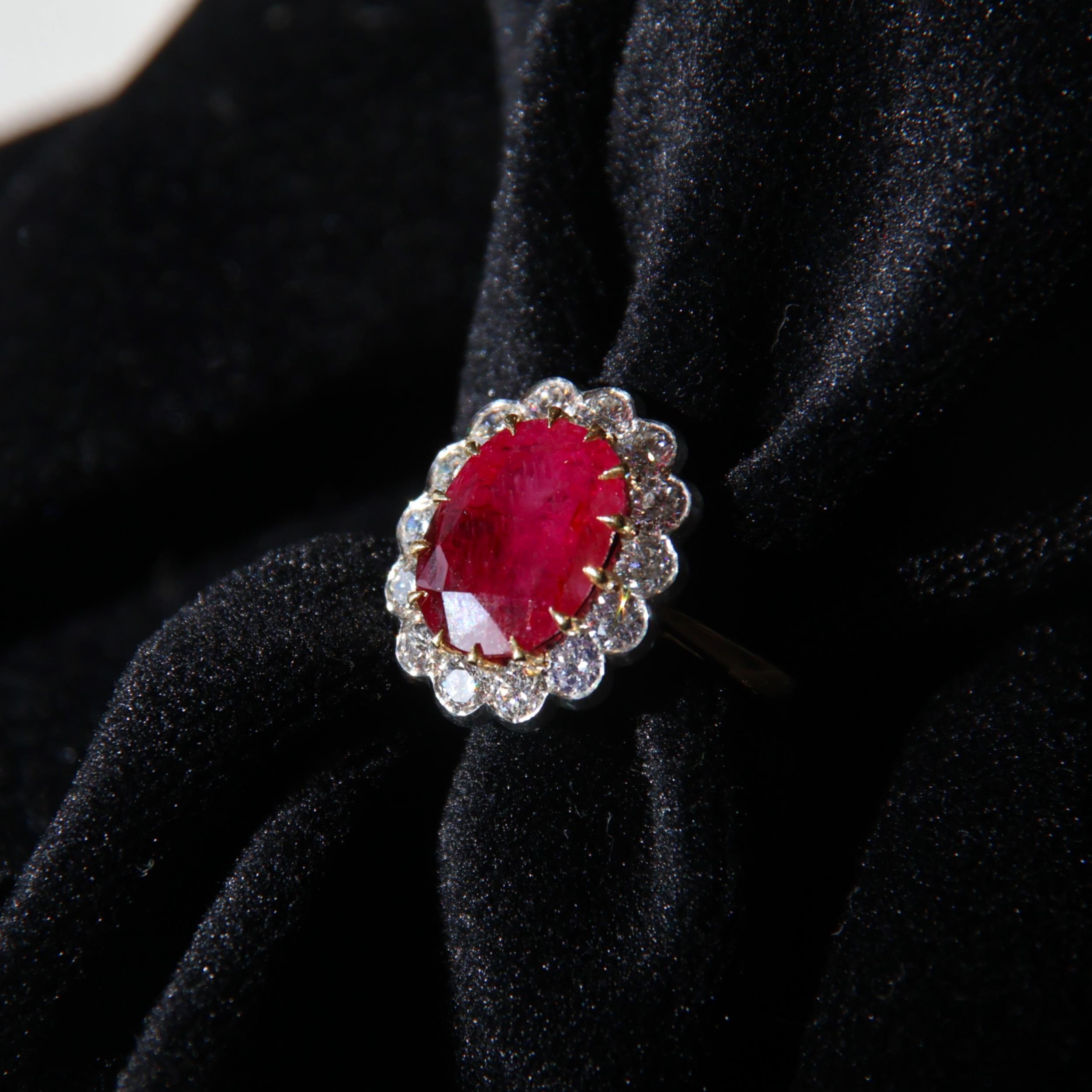 A mid 20th century certified Burmese ruby and diamond cluster ring, the ...