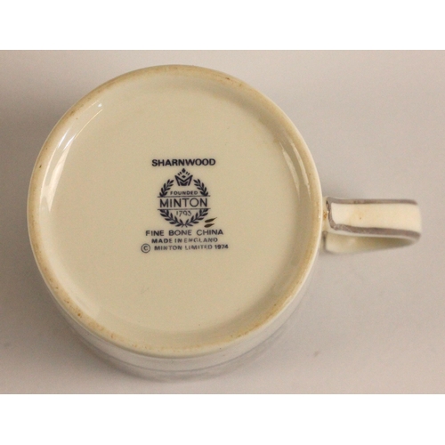 381 - A Minton part dinner service in the 'Sharnwood' pattern, comprising: fourteen soup plates, 20.5cm di... 