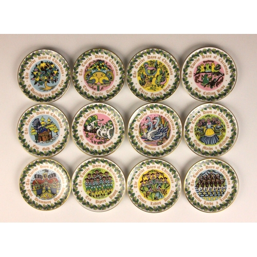 393 - A quantity of Coalport miniature cabinet pieces, to include the 'Twelve Days Of Christmas' cabinet p... 