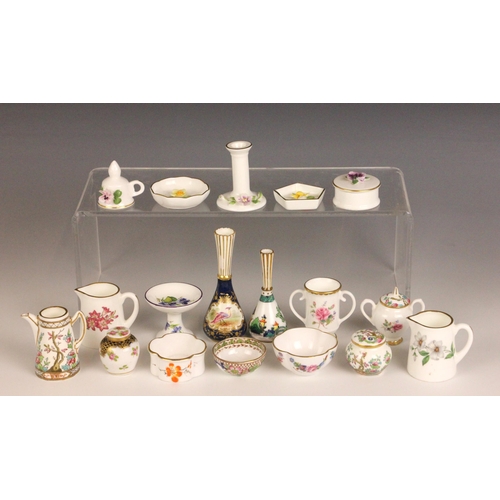 393 - A quantity of Coalport miniature cabinet pieces, to include the 'Twelve Days Of Christmas' cabinet p... 