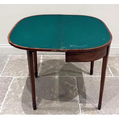A Regency mahogany card table, the rounded rectangular top with ...