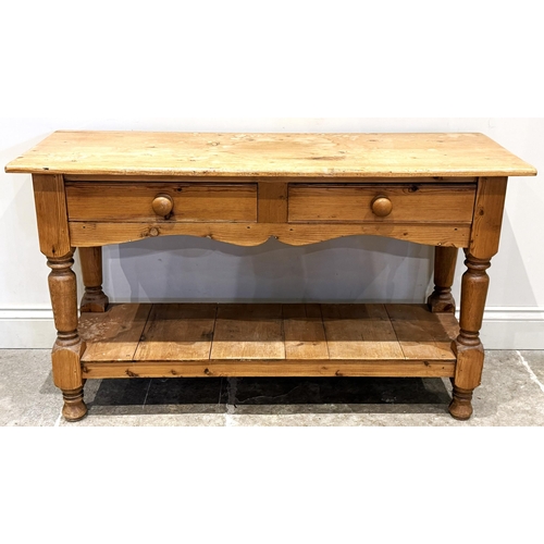 A contemporary pine side table, the rectangular top, above two frieze ...