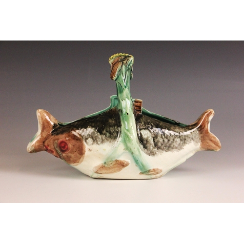 411 - An English Majolica fish basket, 19th century, modelled as two fish joined by a seaweed handle, 23cm... 