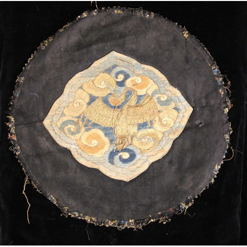 A Chinese silk embroidered panel, 19th century, the lozenge shaped ...