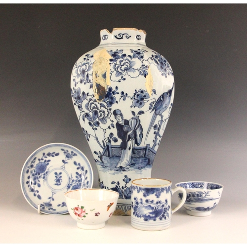 438 - An 18th century blue and white Delft vase, the high shouldered vase of octagonal baluster form exter... 