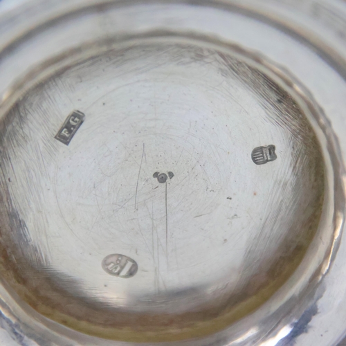 82 - A late 19th century white metal twin handled bowl, possibly Danish, the twin florally cast handles a... 