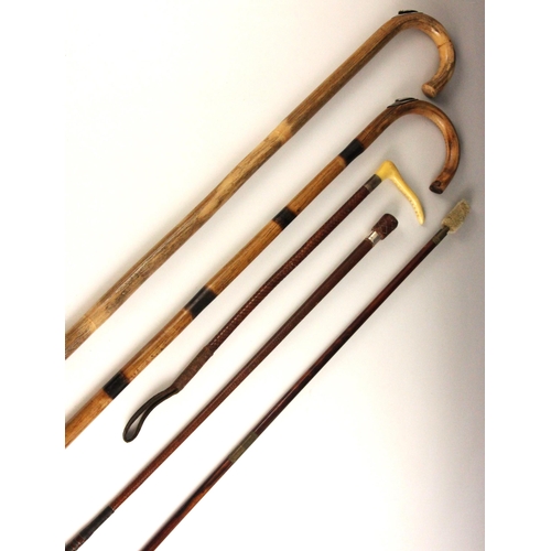 A silver collared riding crop, Swaine & Adeney Ltd, London 1965, the ...