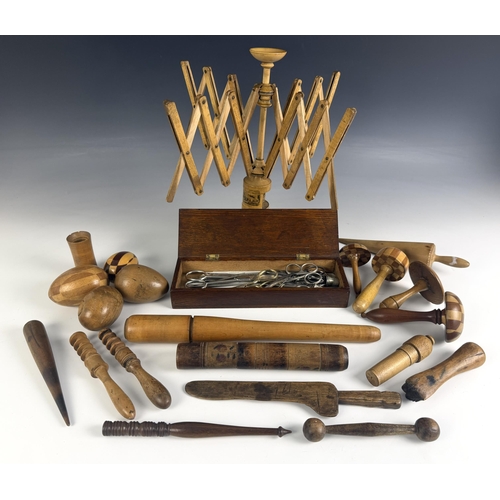 A collection of treen and other needlework tools and equipment, to ...