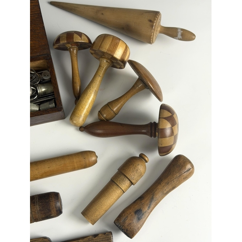 A collection of treen and other needlework tools and equipment, to ...