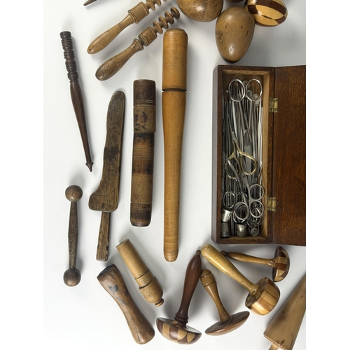 A collection of treen and other needlework tools and equipment, to ...
