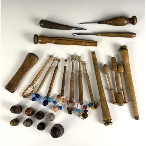 A collection of treen and other needlework tools and equipment, to ...