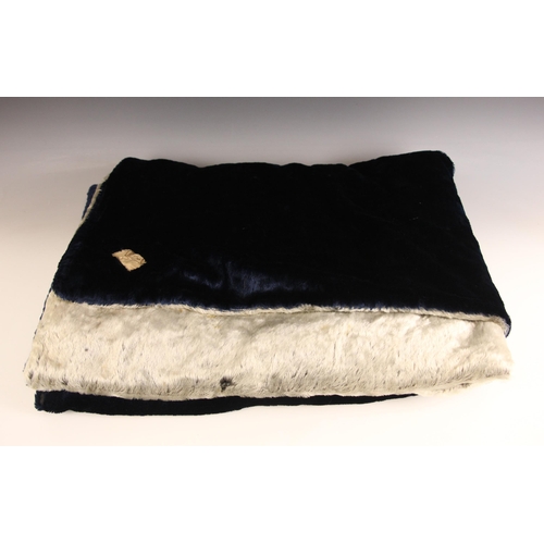 An early 20th century faux fur driving rug, the reversible blanket in ...