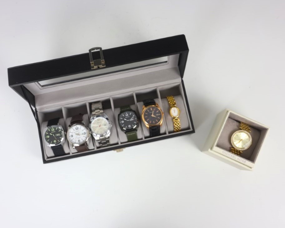 A selection of dress watches, including a Michael Kors example, the ...
