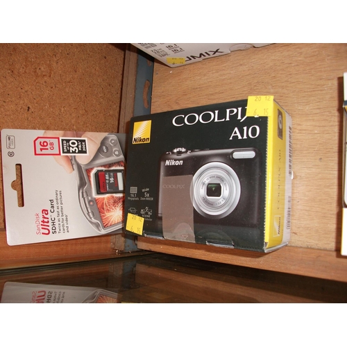 303 - NIKON COOLPIX A10 DIGITAL CAMERA & 16 GB CARD