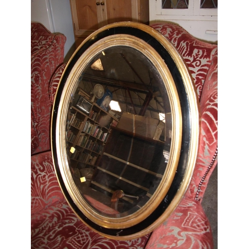 129 - PAIR OF OVAL MIRRORS (GILT & BLACK FRAMES) 29''H X 23.5''L