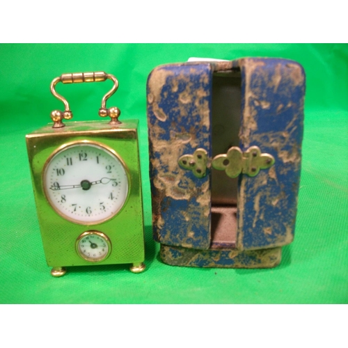 332 - MINITURE BRASS TRAVELLING CLOCK IN CASE