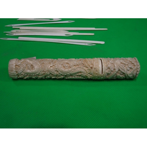 264 - TWO ORIENTAL IVORY ITEMS - NEEDLE CASE & CARVED CARRIER